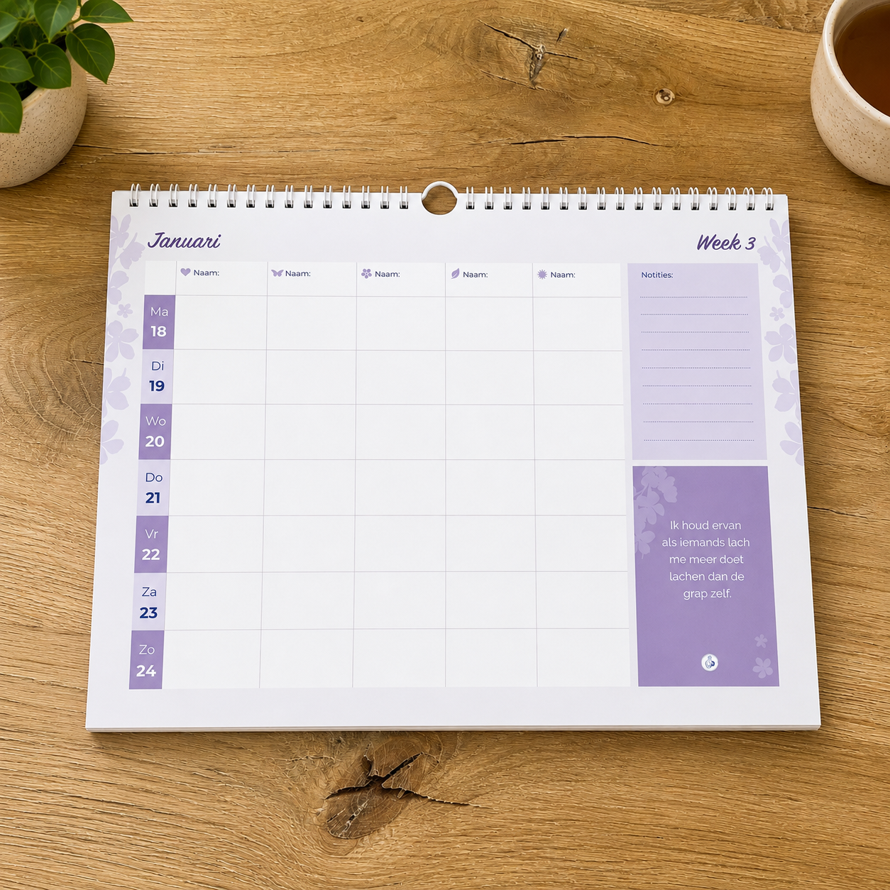 Opengeslagen Familieplanner 2027 op tafel week 3
